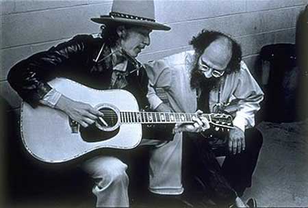 Bob Dylan plays and sings guitar